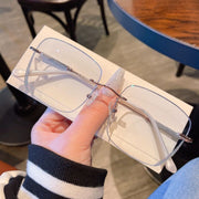 Women’s Frameless Myopia Glasses – Anti Blue Light Oval Lens with Metal Racket Frame | Stylish & Protective Eyewear