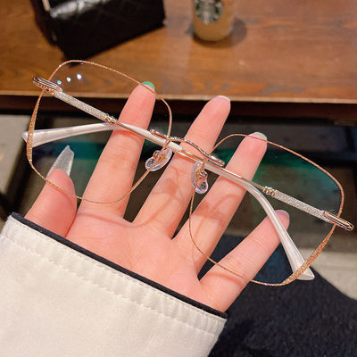 Women’s Frameless Myopia Glasses – Anti Blue Light Oval Lens with Metal Racket Frame | Stylish & Protective Eyewear